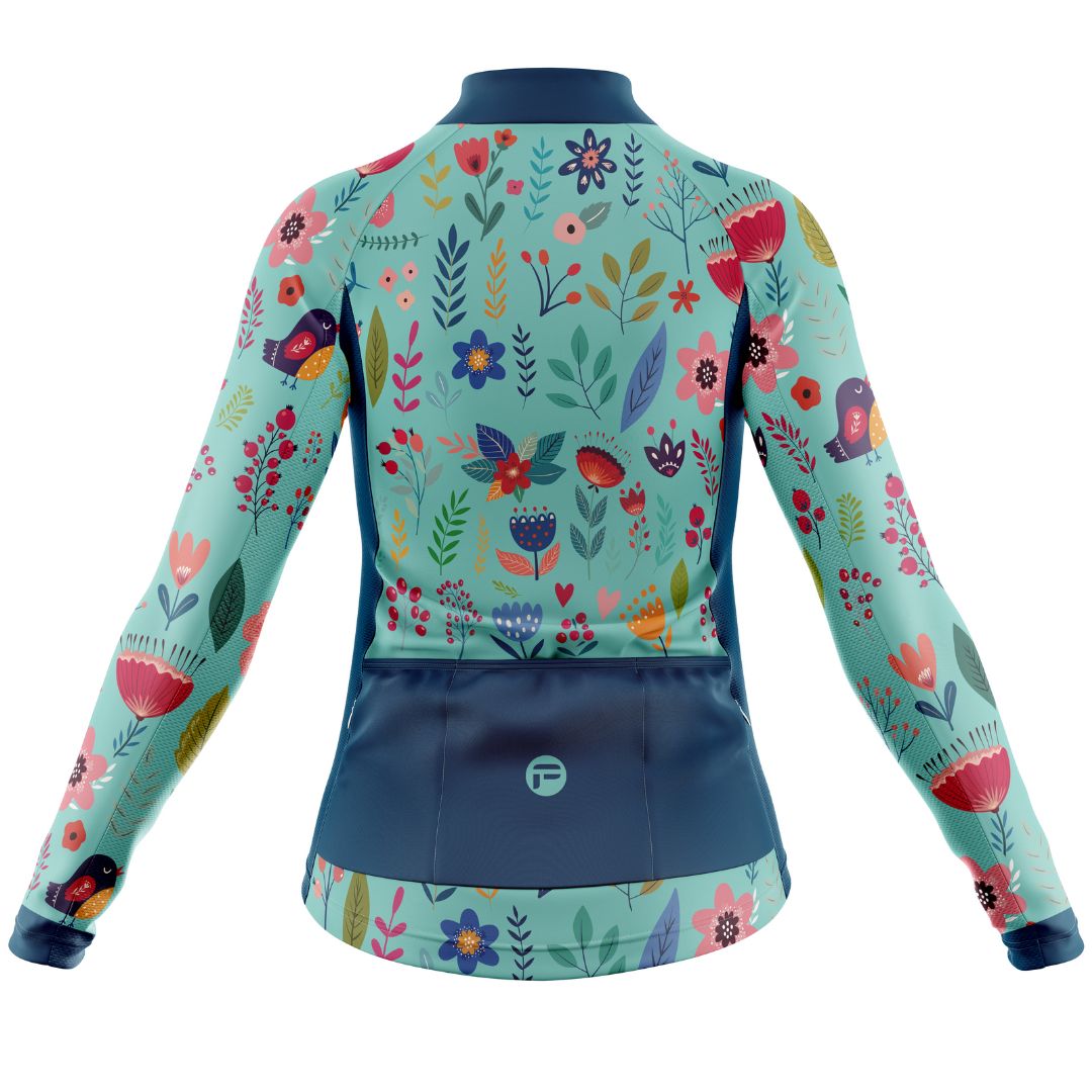 Blooming Garden Women's Cycling Jersey featuring a vibrant and colorful floral design on a turquoise  background, designed for optimal comfort, breathability, and aerodynamics.