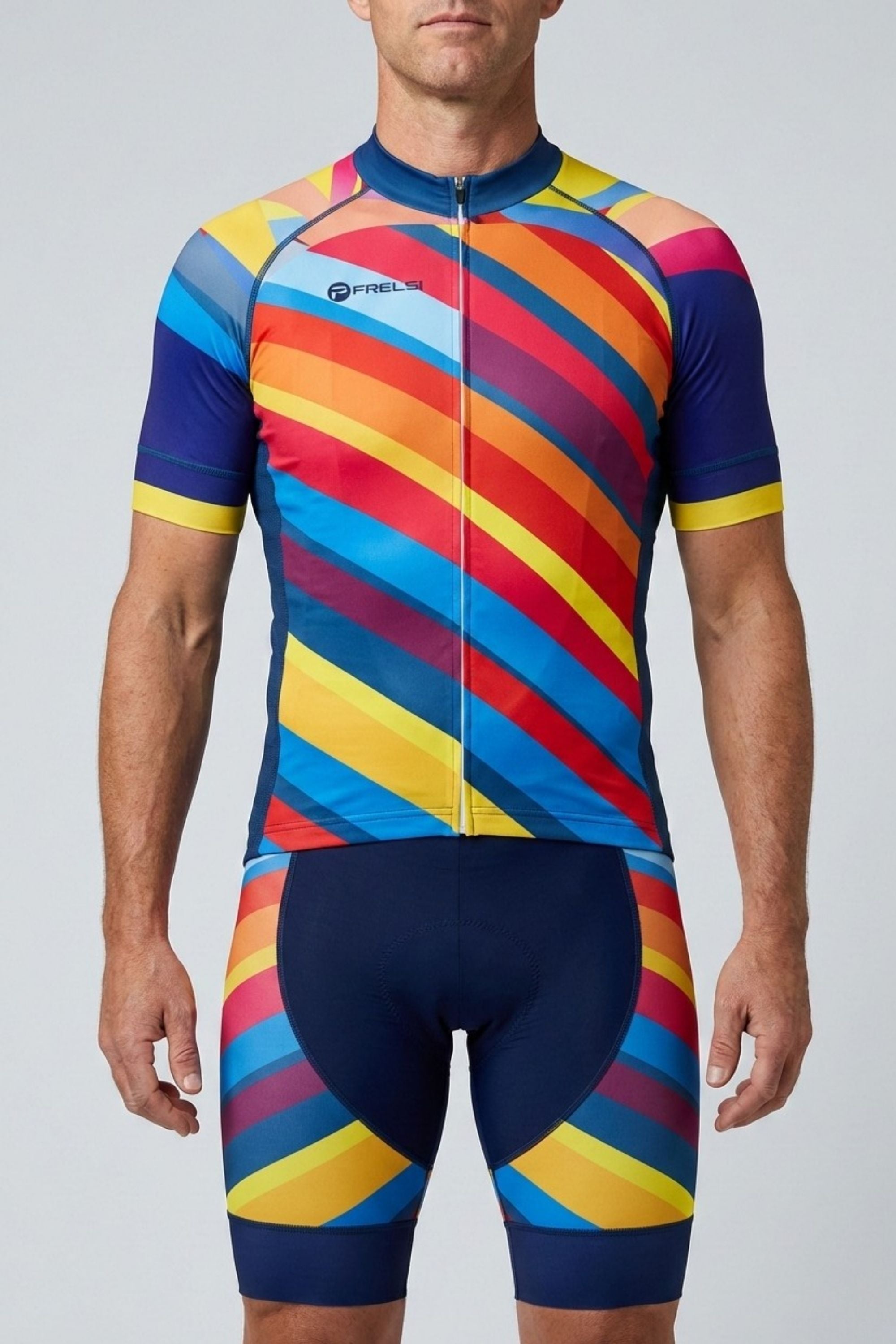 Person wearing a colorful cycling jersey and shorts on a plain background