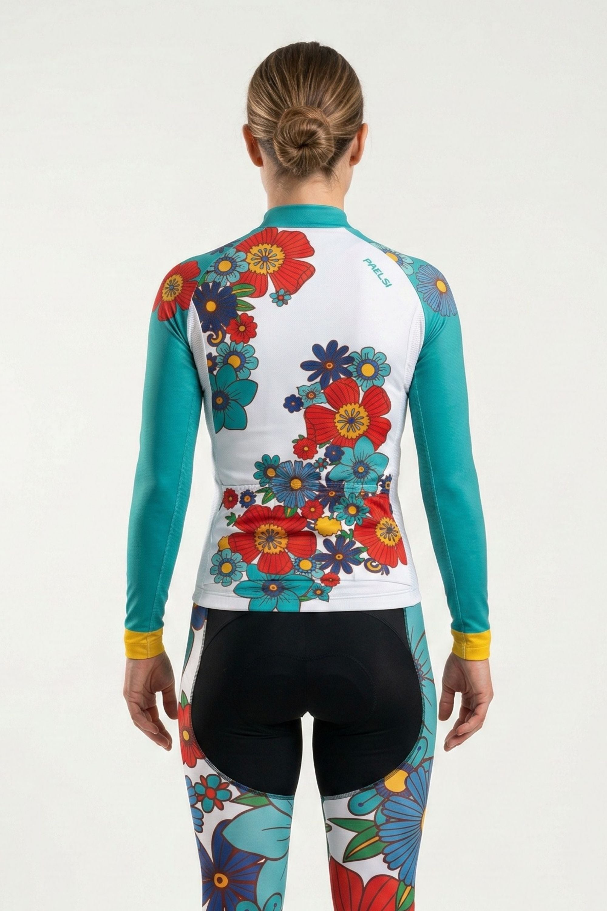 Colorful floral cycling suit on a white background