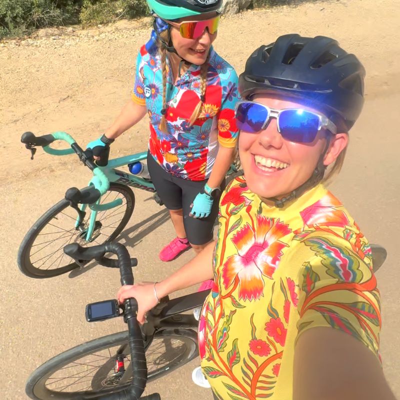 Cyclist women wearing Cycling Frelsi colorful cycling kits for year 2025