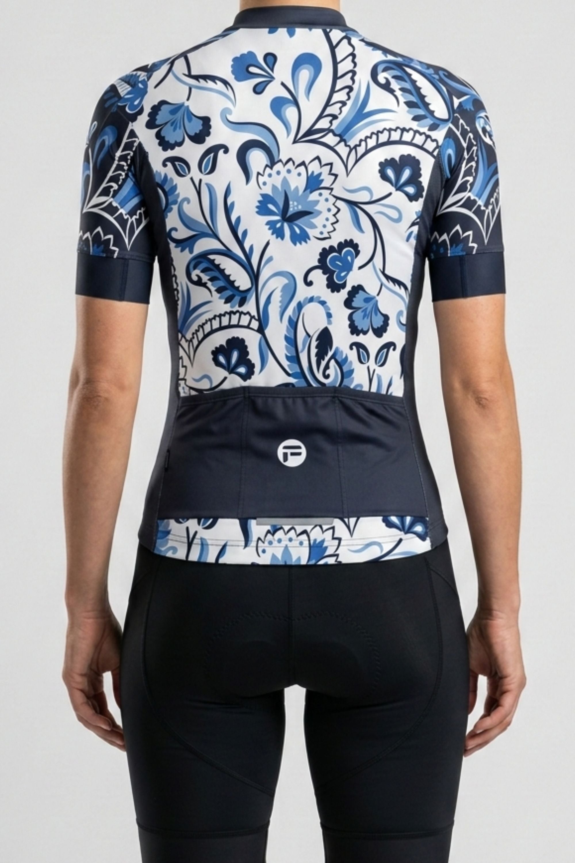 Cycling jersey with blue floral pattern on a white background