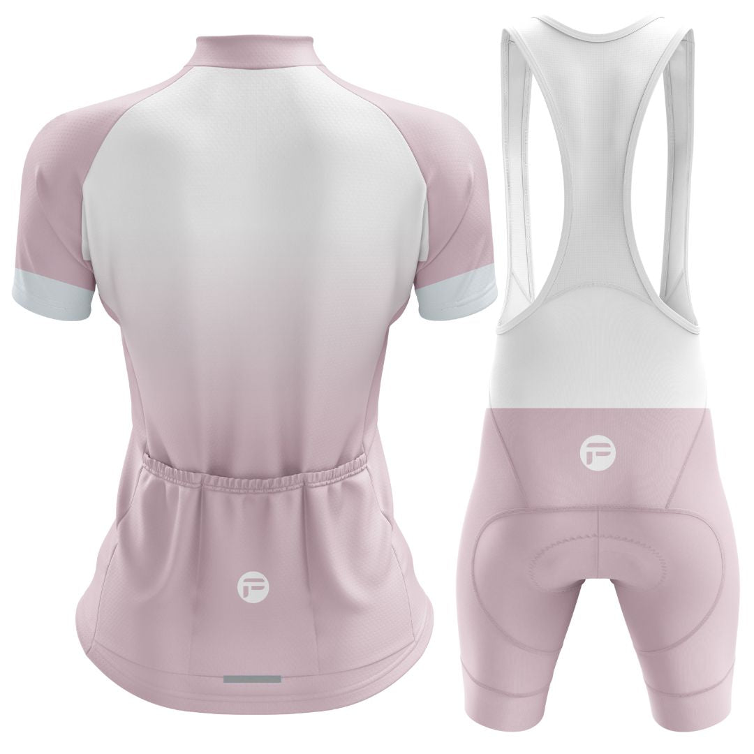 Elysian Pink Frelsi Set back details: jersey with zippered pocket, bib shorts with silicone grippers, and UV-protective fabric for long summer rides.