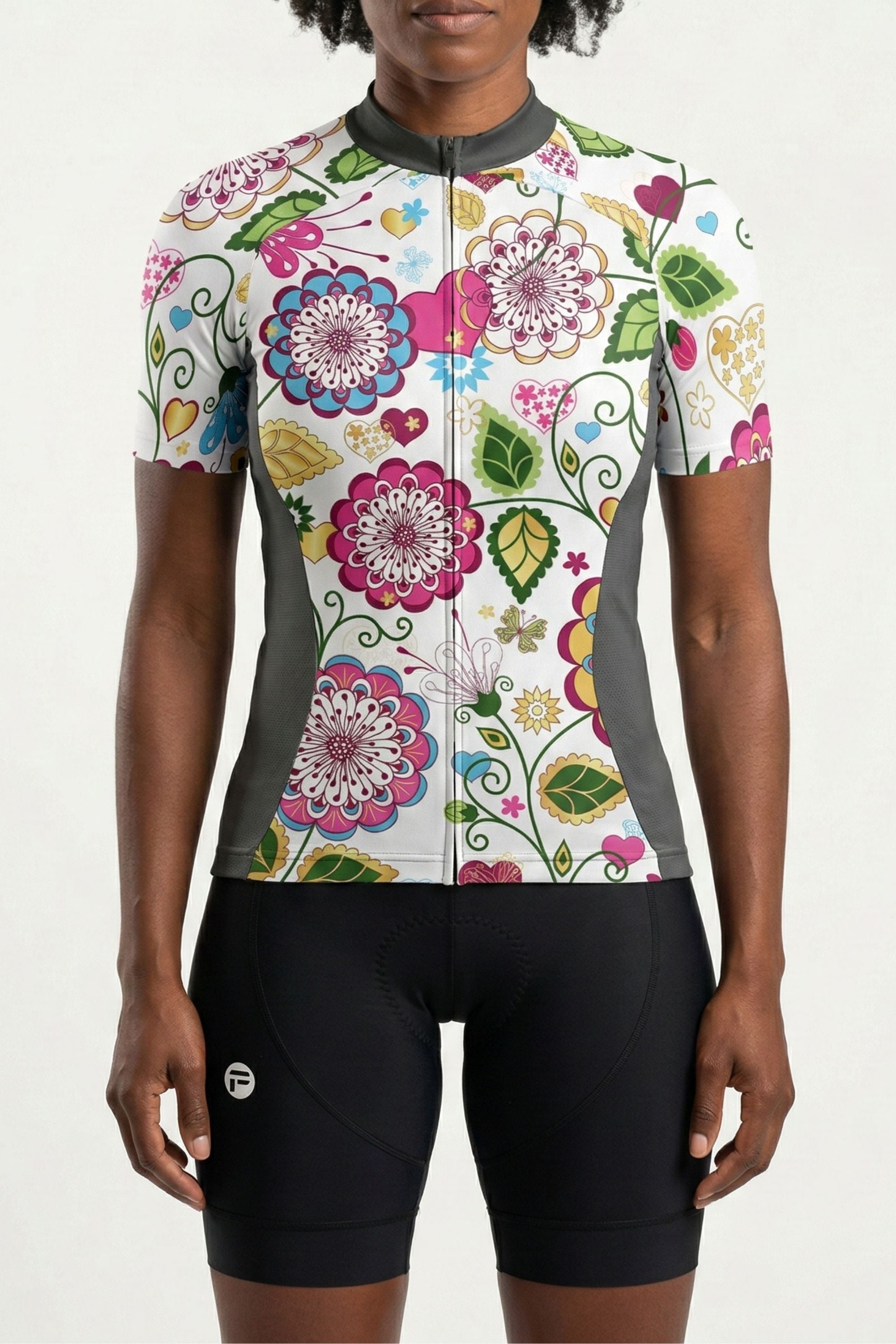 Cycling jersey with colorful floral design on a white background