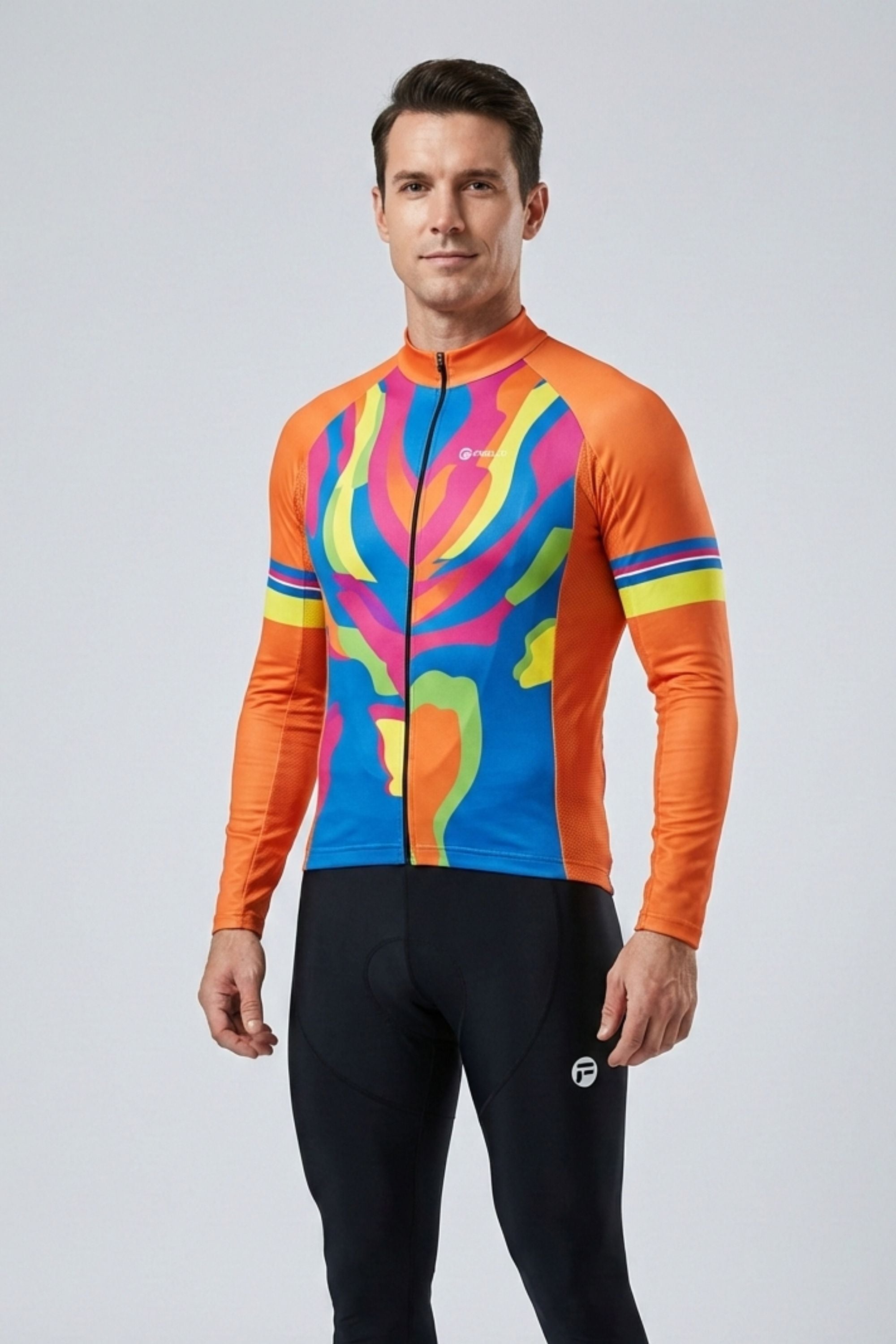 Man wearing a colorful cycling jersey with orange sleeves on a gray background