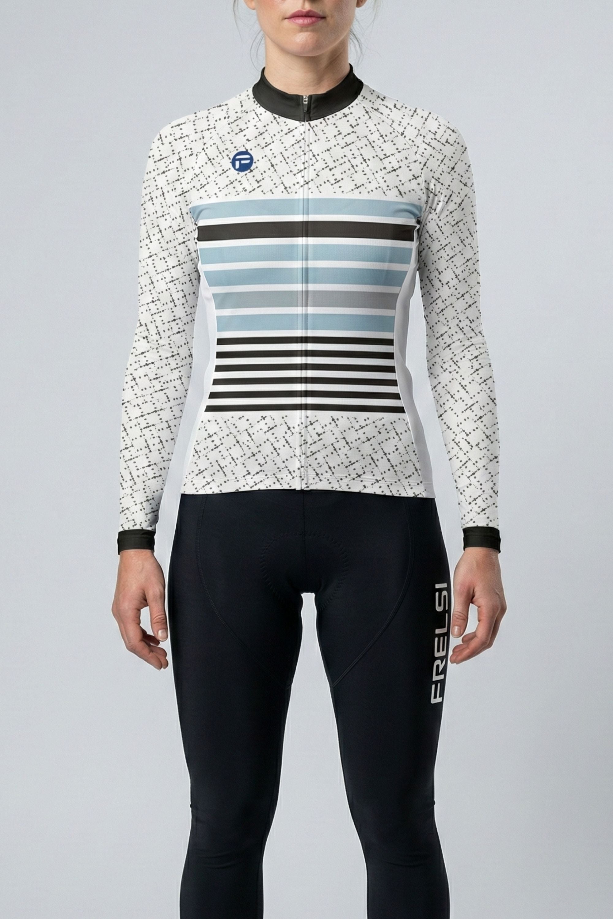 Person wearing a white cycling outfit with blue stripes on a plain background by Cycling Frelsi