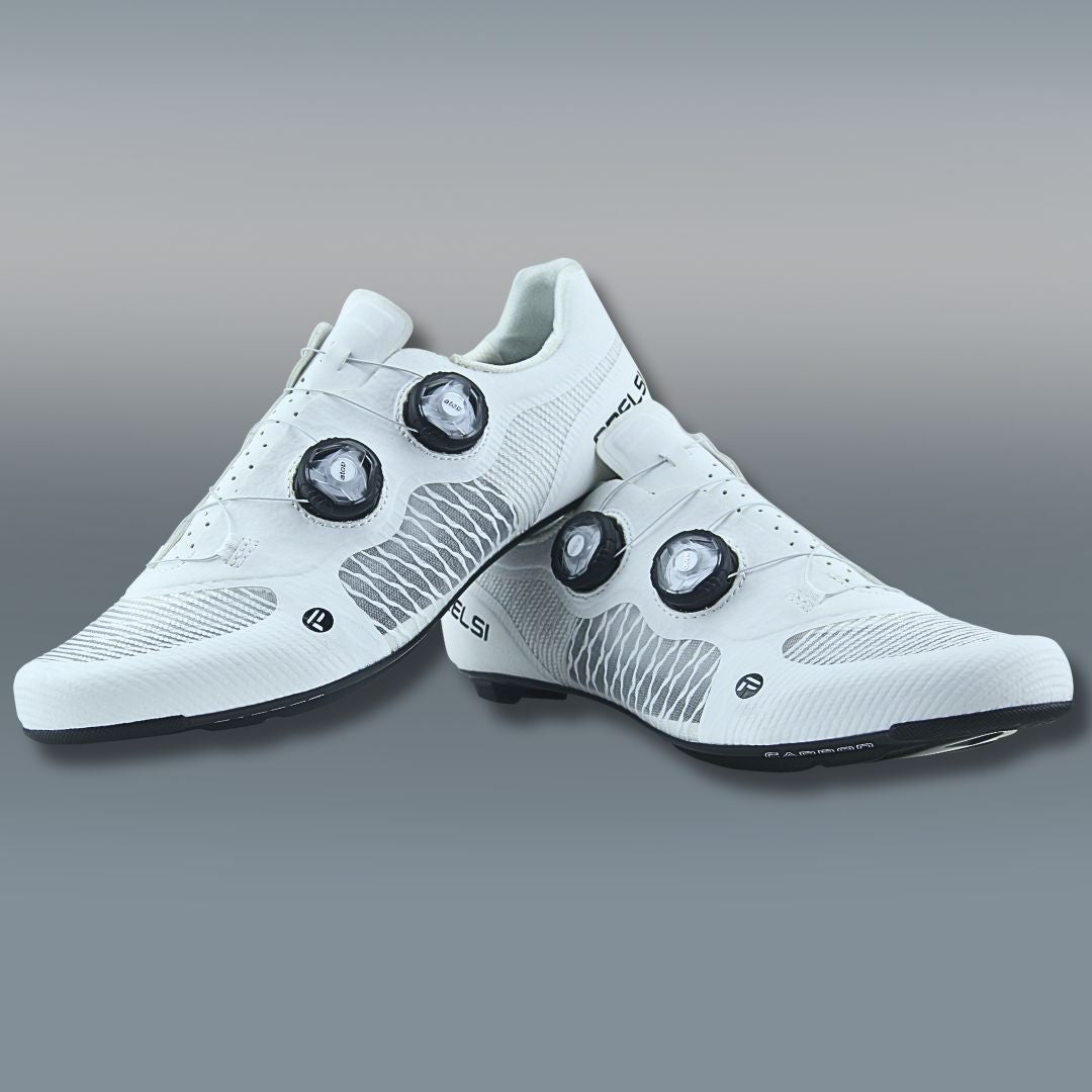 White Frelsi Pro Team shoes showcasing the dual Atop Dial closure system with micro-adjustment increments for a precise and comfortable fit.
