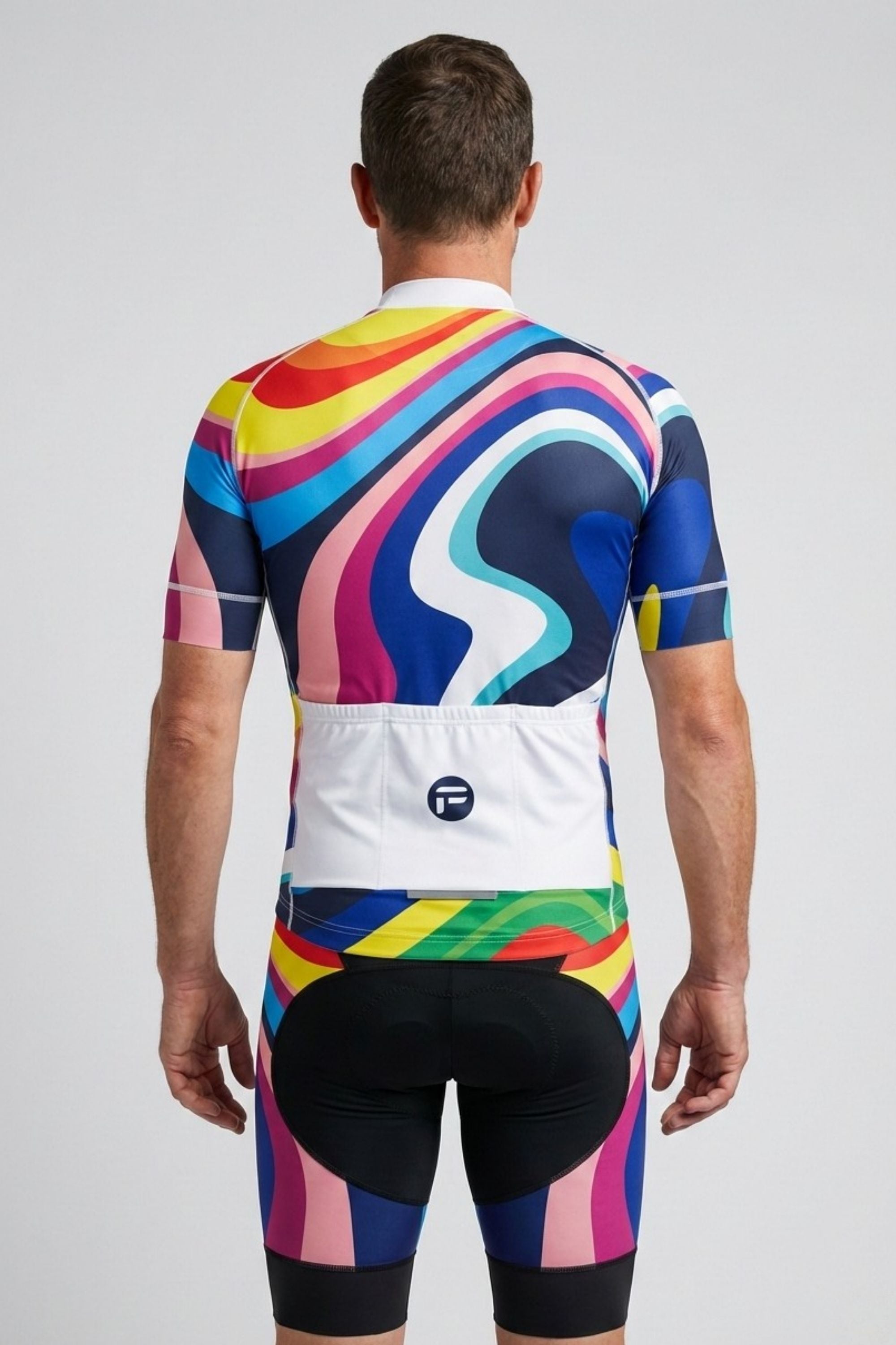 Person wearing a colorful cycling outfit with a white background