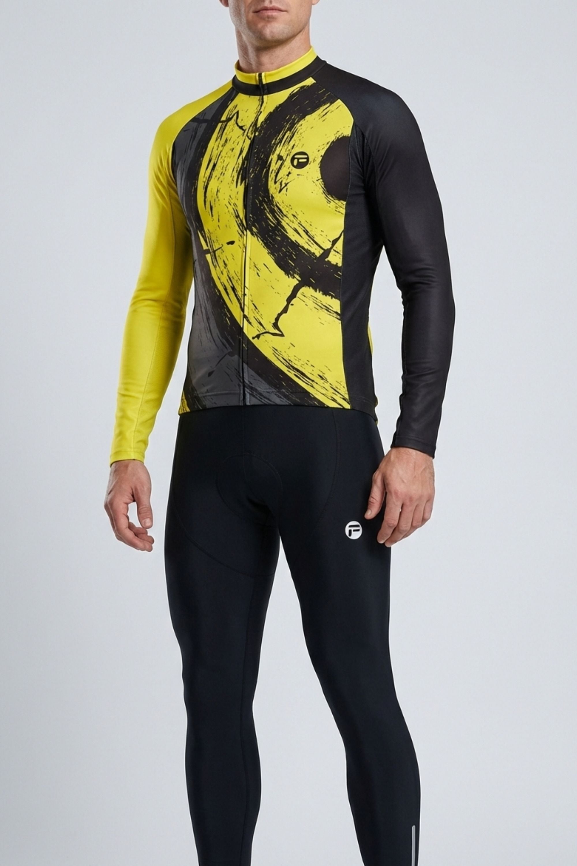 Person wearing a black and yellow cycling outfit on a white background