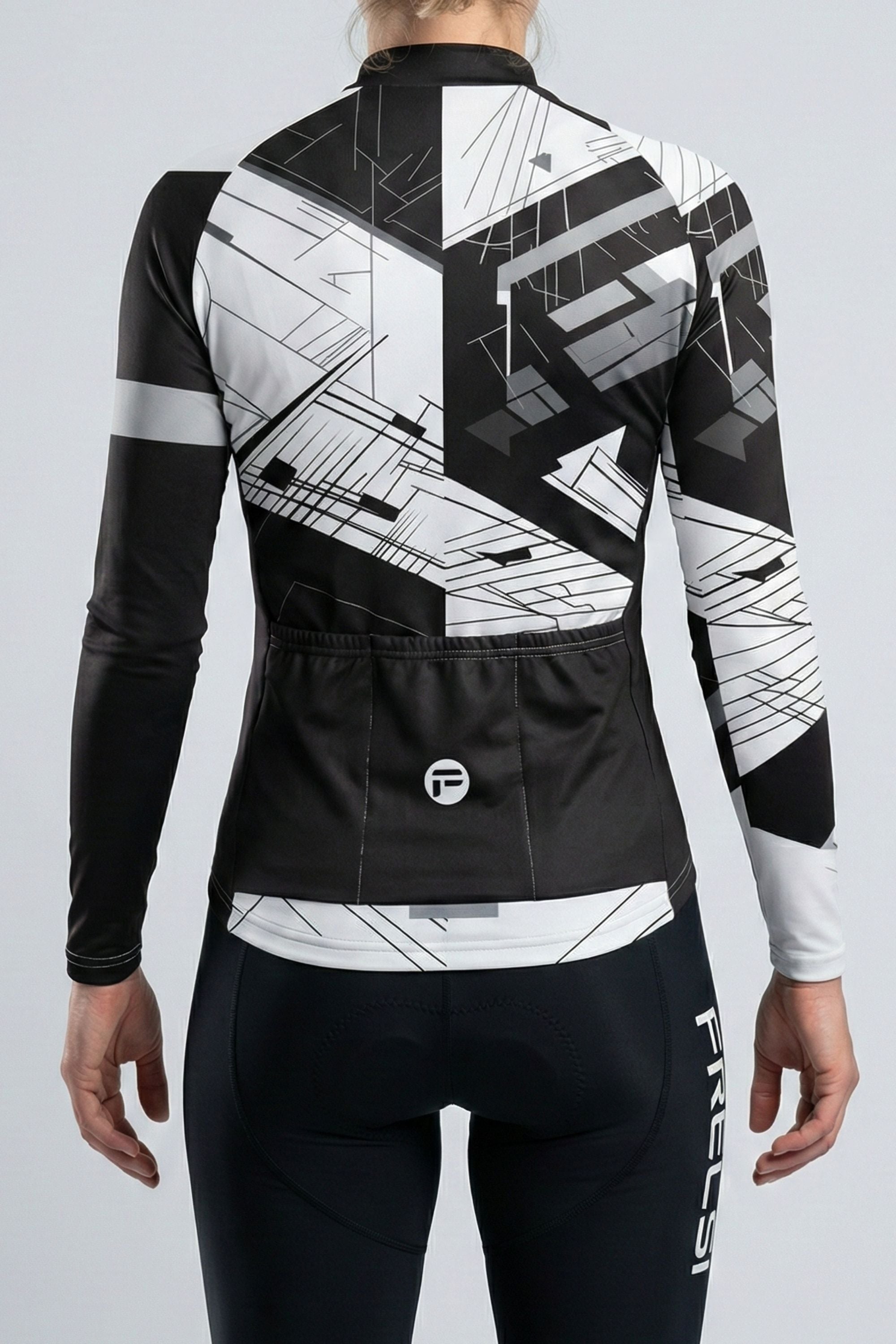 Person wearing a white cycling outfit with black stripes on a plain background by Cycling Frelsi