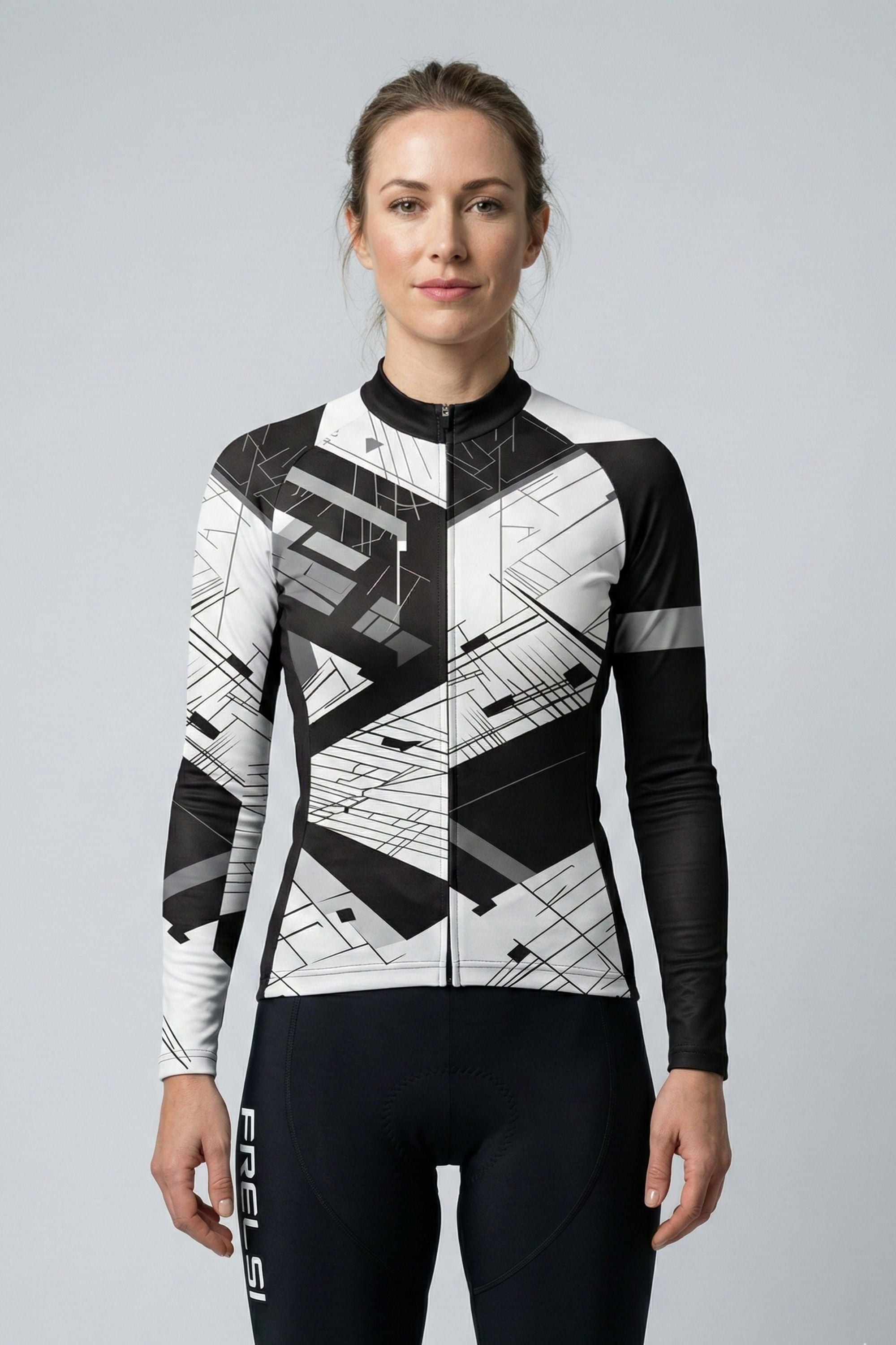 Person wearing a white cycling outfit with black stripes on a plain background by Cycling Frelsi