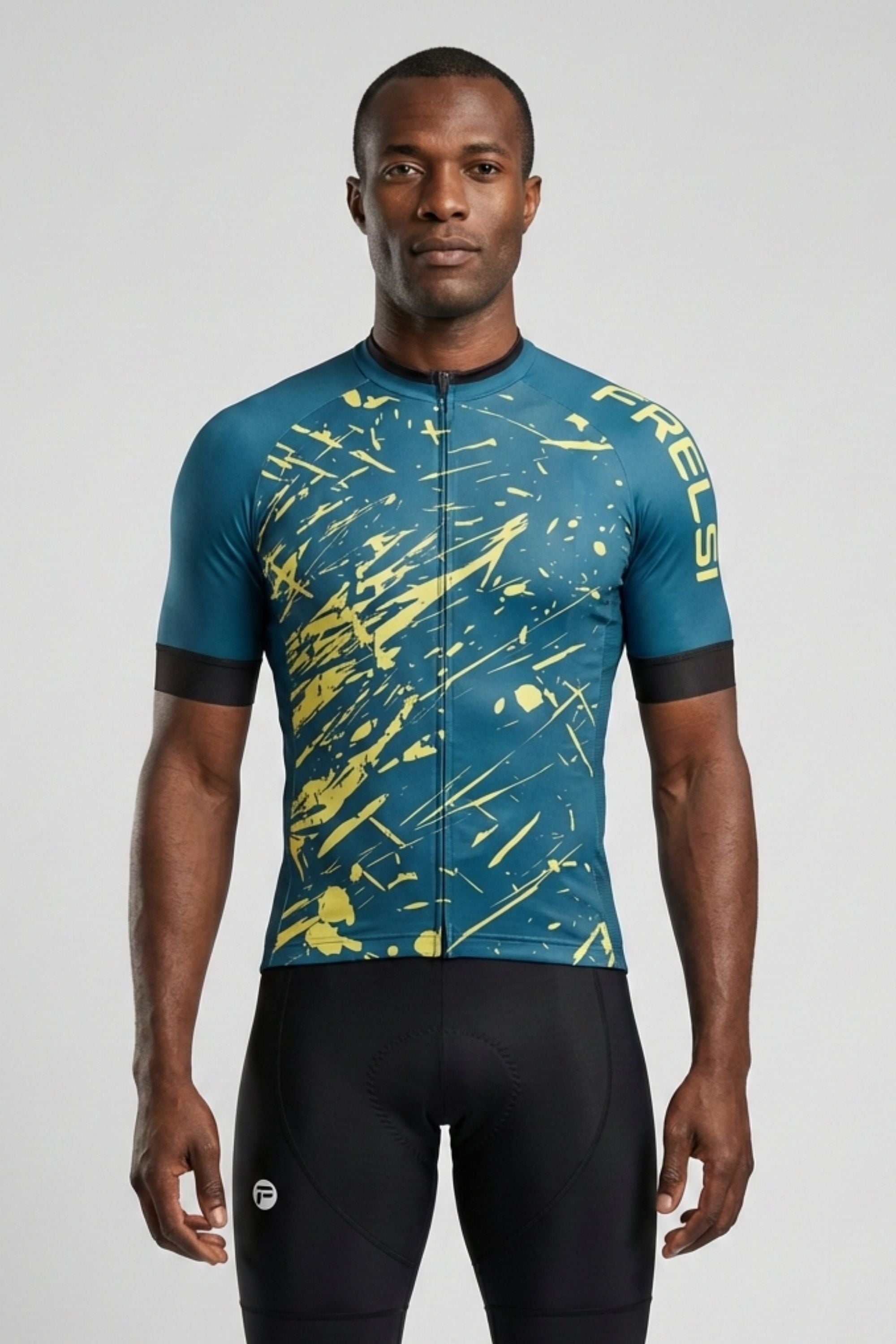 Person wearing a teal and yellow cycling jersey with 'Pirelli' branding on a gray background