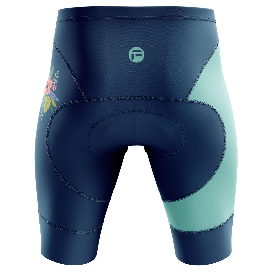 Blooming Garden Women's Cycling Kit featuring a vibrant and colorful floral design on a turquoise  background, designed for optimal comfort, breathability, and aerodynamics.