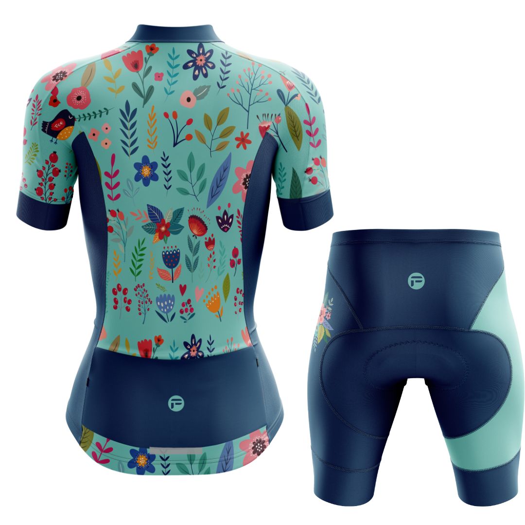 Blooming Garden Women's Cycling Kit featuring a vibrant and colorful floral design on a turquoise  background, designed for optimal comfort, breathability, and aerodynamics.