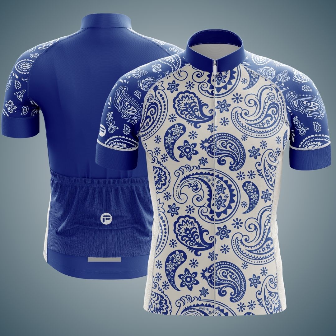 Blue and white short sleeve cycling jersey featuring an intricate paisley and floral pattern design. The jersey has a full zipper front and a breathable, comfortable fit, ideal for warm-weather cycling.