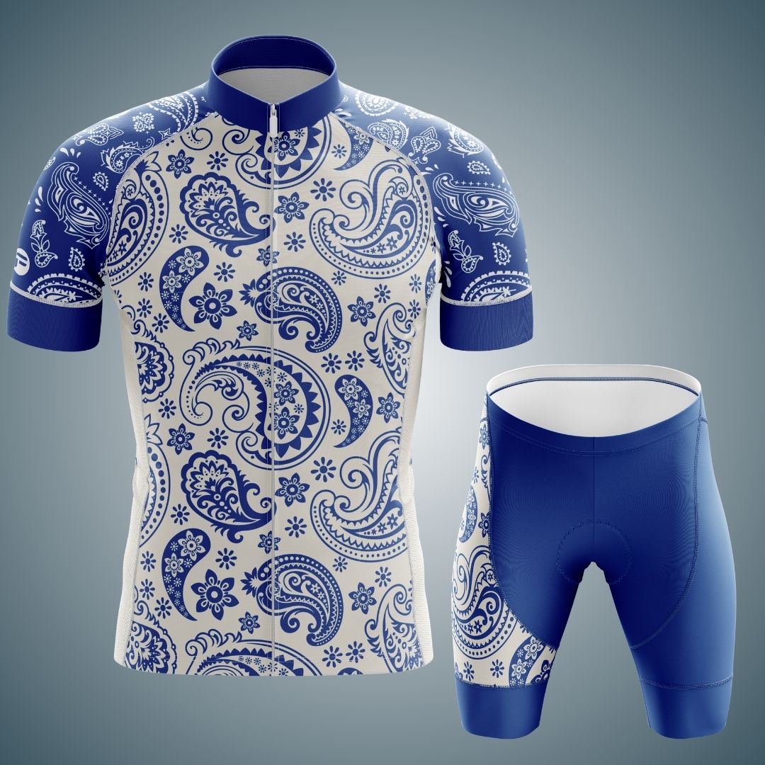 Blue and white short sleeve cycling jersey and matching cycling shorts set with a detailed paisley and floral pattern. The jersey features a full zipper front, and the shorts have a coordinating design for a stylish and cohesive look.