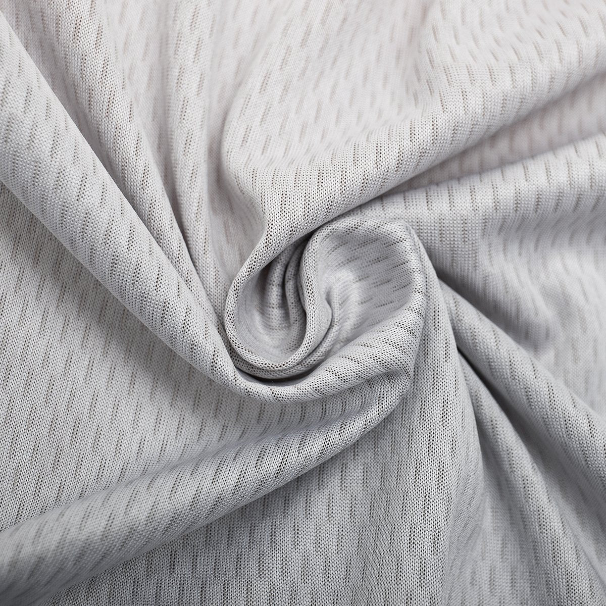 Close up on the breathable and moisture-wicking fabric of a short sleeve cycling jersey for men with many colors , called 'Thunderbolt Racer'