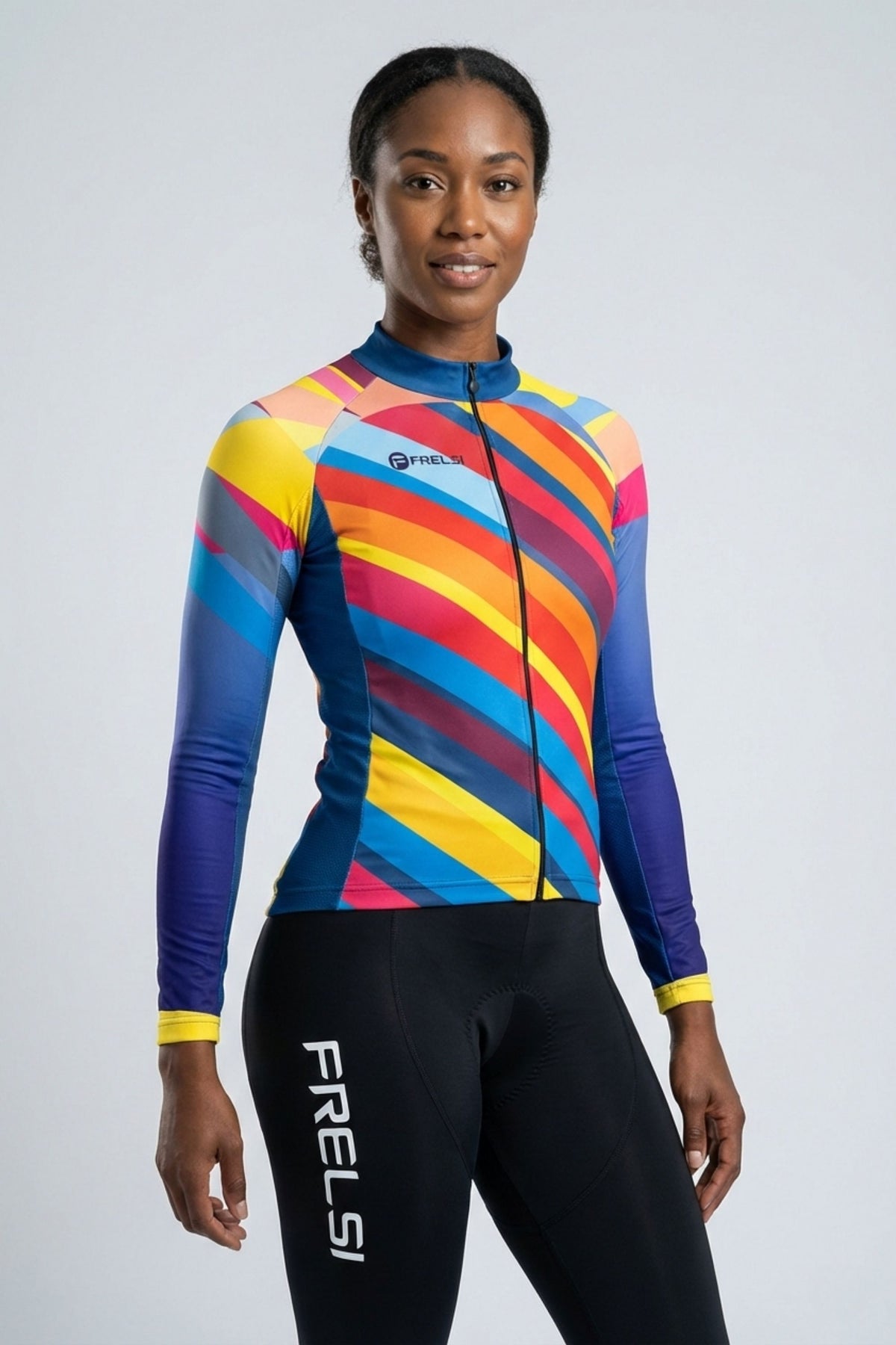 Person wearing a colorful cycling jersey accents by Cycling Frelsi on a gray background