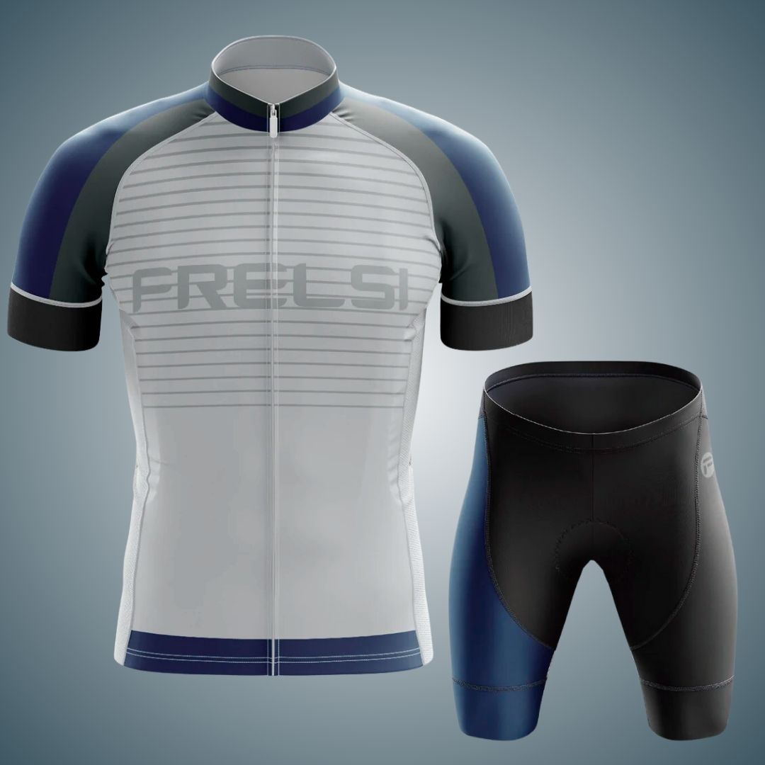 White and navy short sleeve cycling jersey and black cycling shorts set with a sleek blueprint-inspired design. The jersey features horizontal lines across the front with the 'Frelsi' logo, paired with matching shorts for a cohesive look.