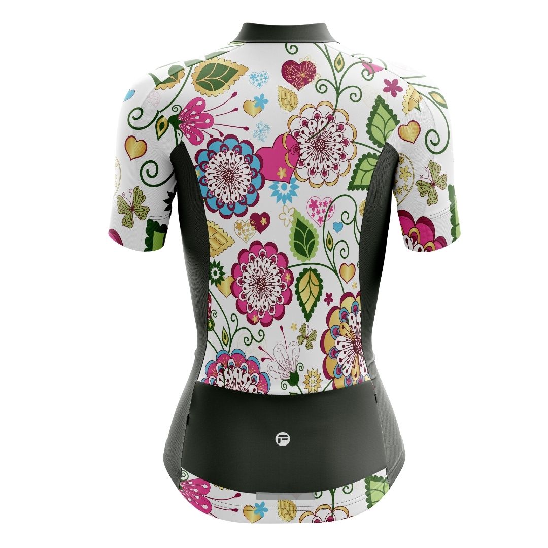 Women's cycling jersey featuring a vibrant floral pattern and reflective accents.