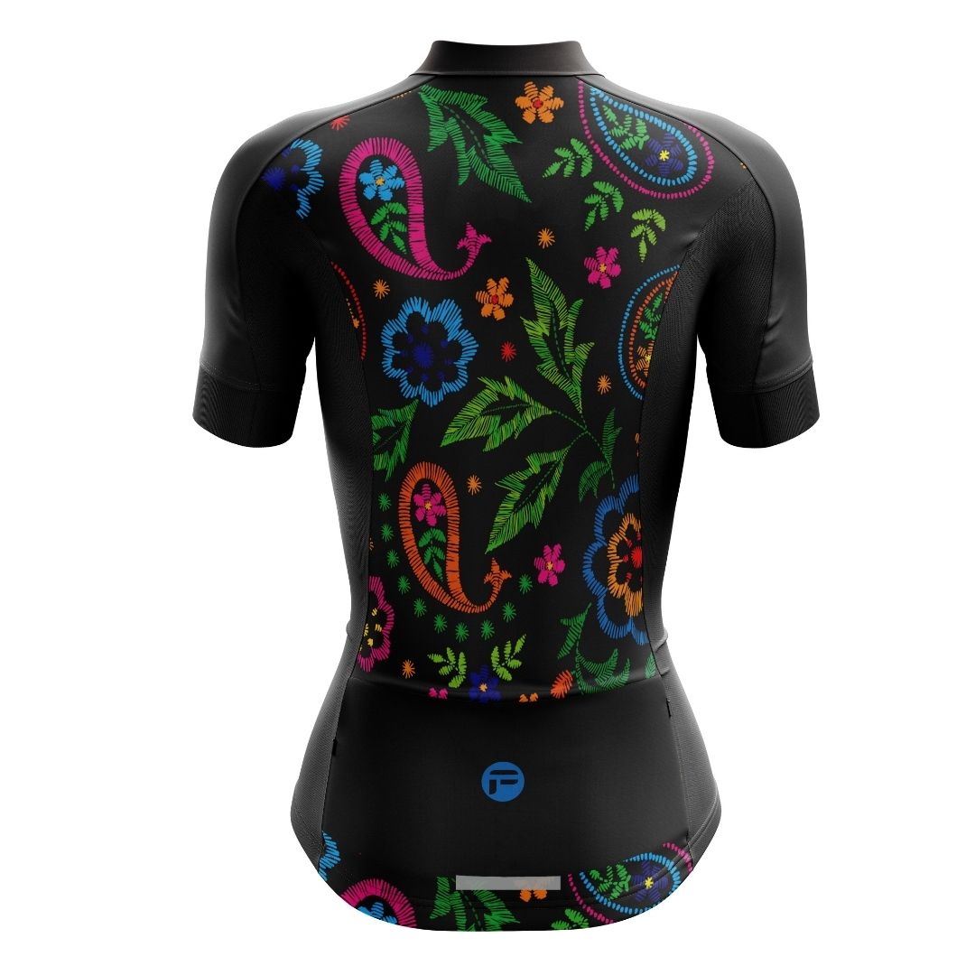 Midnight Bloom | Women's Short Sleeve Cycling Jersey back image with 3 rear pockets. The back of the jersey features a large design of blue and pink flowers that resemble roses and pansies.