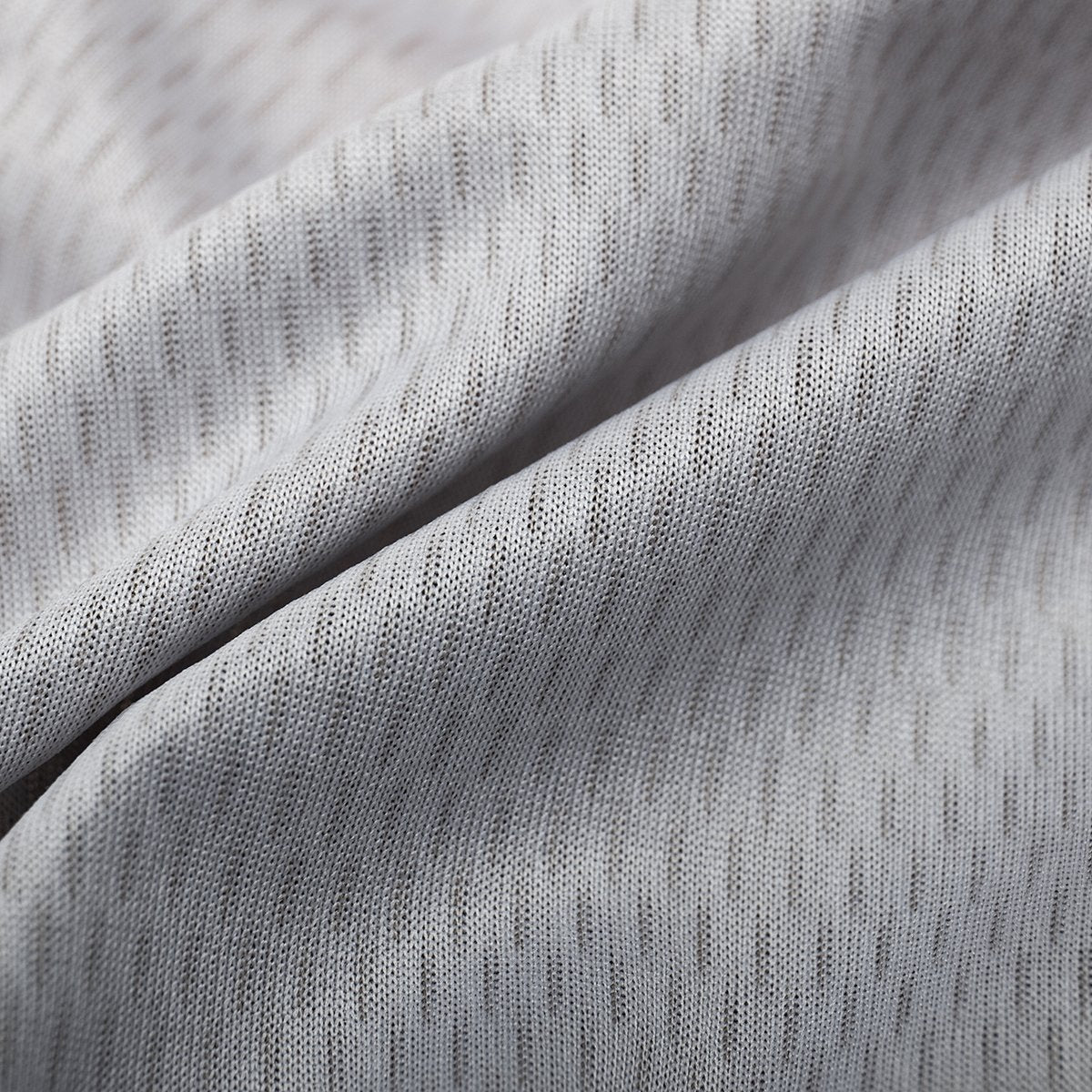 close up on the Moisture Wicking fabric of Colorful short cycling jersey for men with many colors , called 'Color Carnival'