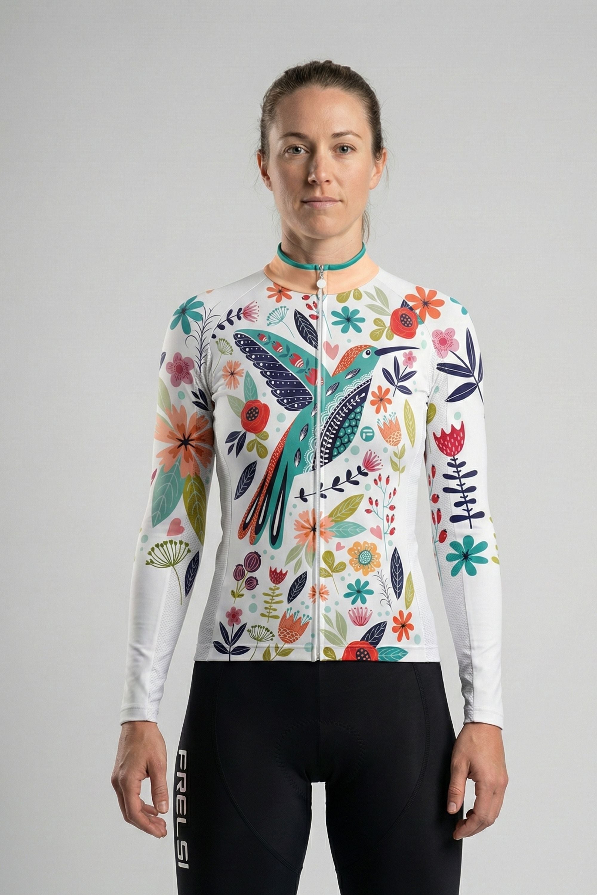 Person wearing a whit cycling jersey with a bird carton accents by Cycling Frelsi on a gray background