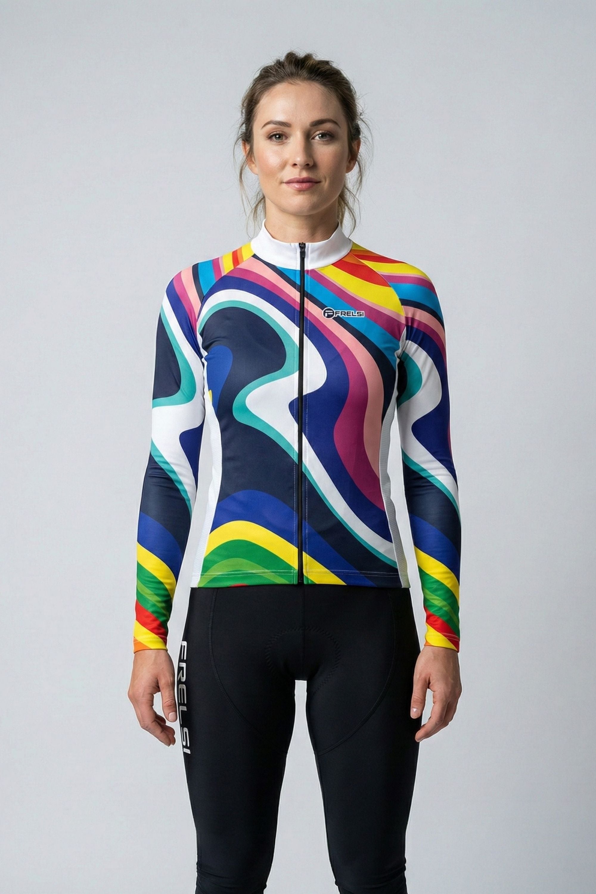 Person wearing rainbow colors cycling jersey accents by Cycling Frelsi on a gray background