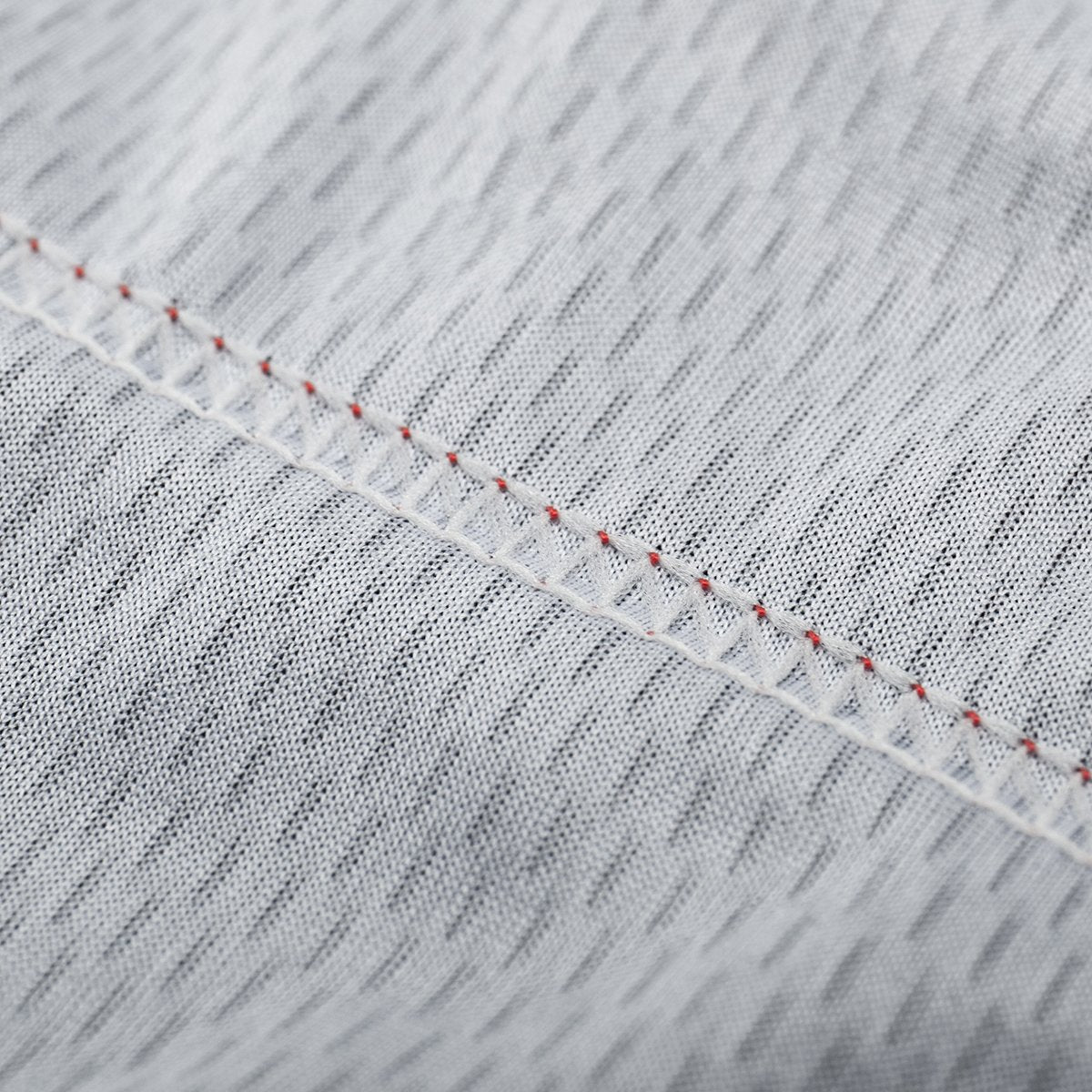 close up on the stitches of Colorful short cycling jersey for men with many colors , called 'Color Carnival'
