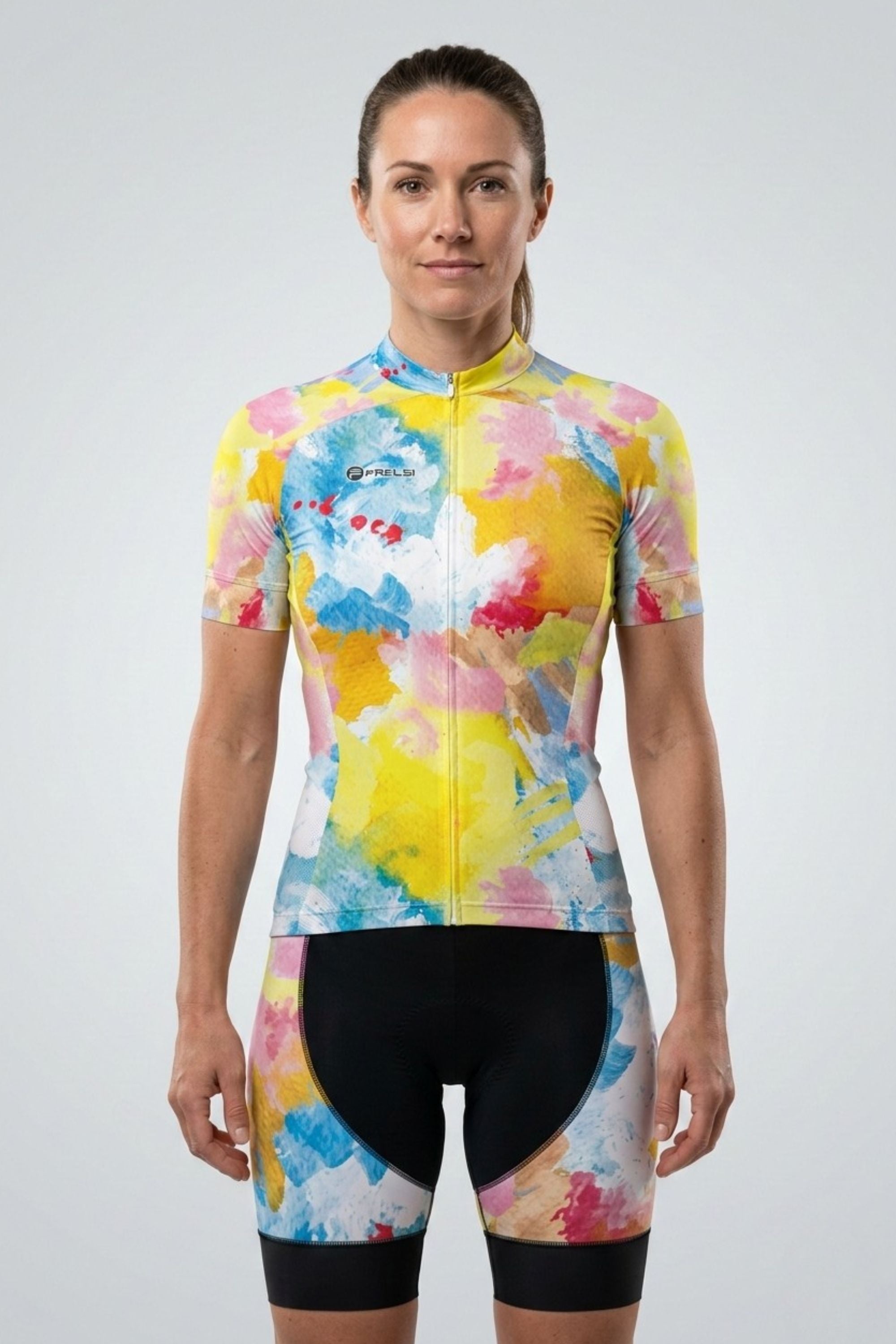 Woman wearing a colorful cycling suit on a white background