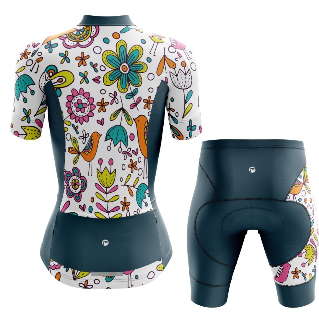 Back Image of Whimsy Blooms women's short cycling kit, featuring a jersey and matching shorts with floral patterns.