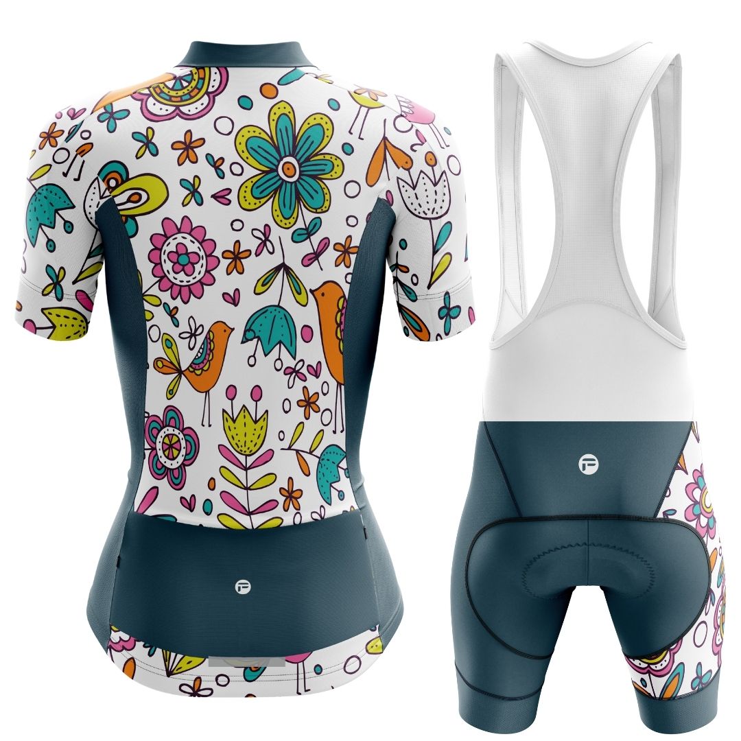 Back image of Whimsy Blooms women's short cycling kit, featuring a jersey and matching bib shorts with floral patterns.